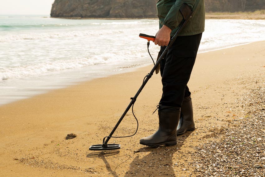 Metal detecting on UK beach