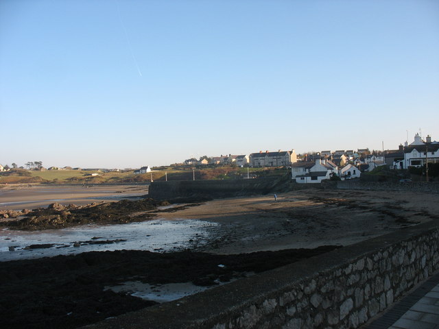 Beach north of the harbour breakwater at Cemaes Photo | UK Beach Guide